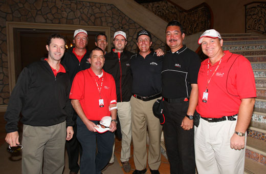 The Abate Risk team pose with their client, Phil Mickelson