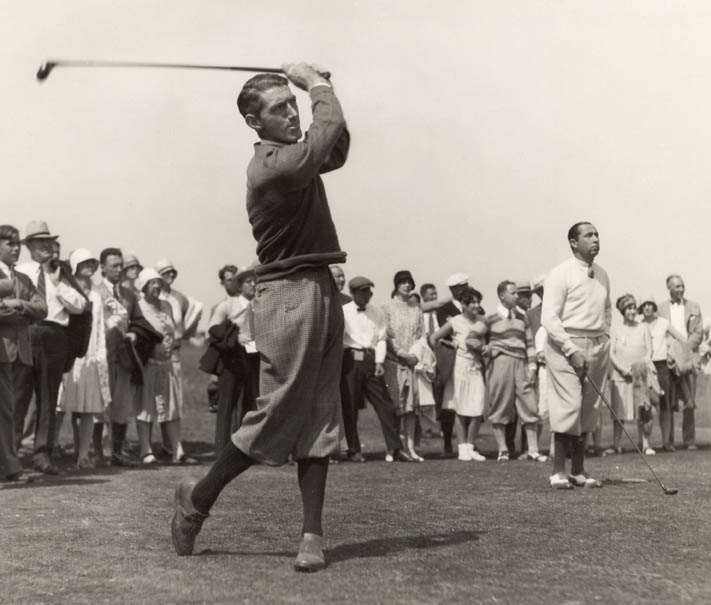 Tommy hitting as mentor Walter Hagen looks on