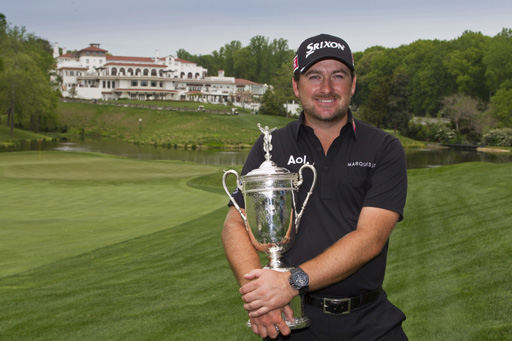 Defending U.S. Open champion Graeme McDowell poses with the trophy