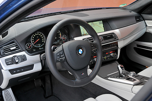 The interior is lush, trimmed in supercar materials