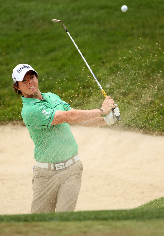 Rory McIlroy hits a bunker shot during a practice round prior
to the 111th US Open