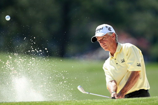 Larry Mize hits out of a bunker