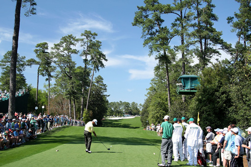 Larry Mize tees off at Augusta