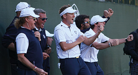 Poulter and his teammates react after Rose beats Mickelson in the singles