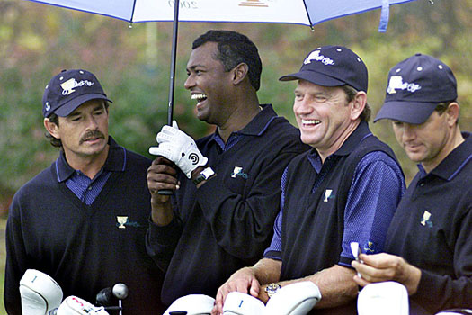 Price shares a laugh with teammates Carlos Franco, Vijay Singh and Refief Goosen in 2000