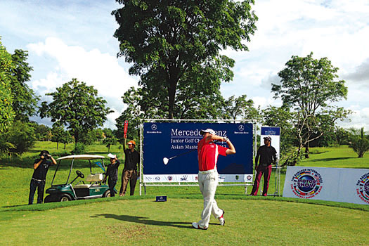 Jackie Chan tees off at the Mercedes-Benz Junior Golf Championship Asian Masters Final