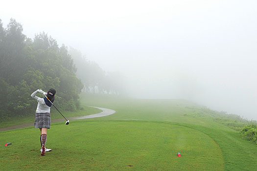 Carrie-Ann Lee drives at the seventh hole on the Diamond Course at Discovery Bay Golf Club