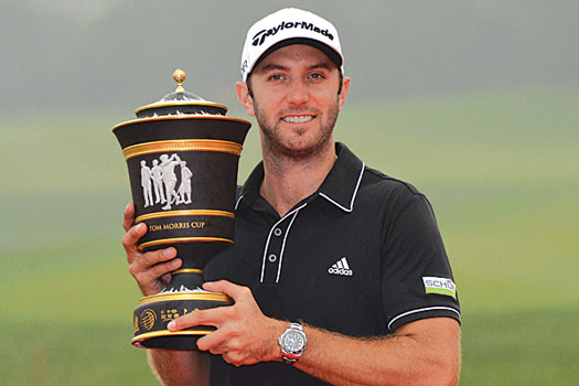 Dustin Johnson held off the challenge of Ian Poulter to win his first title on Asian soil