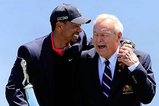 Tiger Woods and Arnold Palmer share a laugh during the trophy presentation 