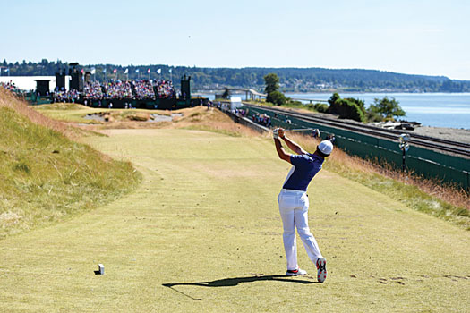 Rory McIlroy plays his tee shot at the par-4 17th at Chambers Bay