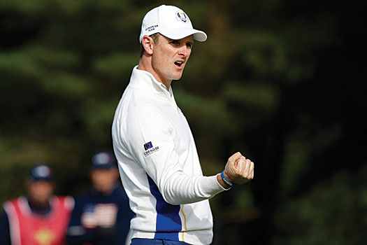 Celebrating a crucial holed putt during the 2014 Ryder Cup at Gleneagles