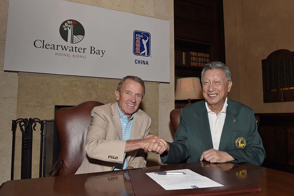 PGA Tour Commissioner Tim Finchem signs a three-year agreement with Club Chairman Wyman Li