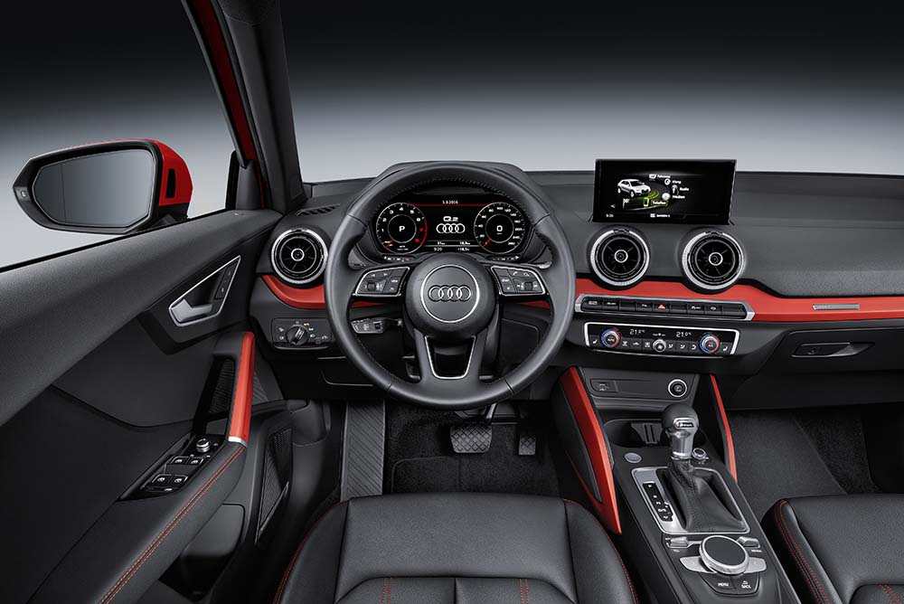 The driver’s seat position is sporty and low in relation to the steering wheel