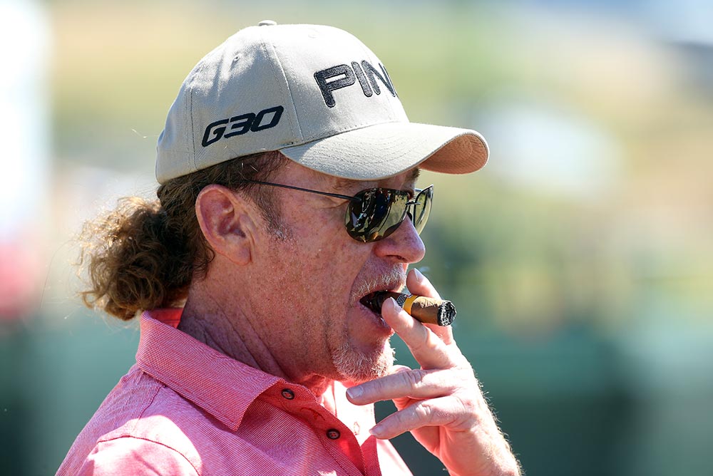 Miguel Angel Jimenez smoking a cigar