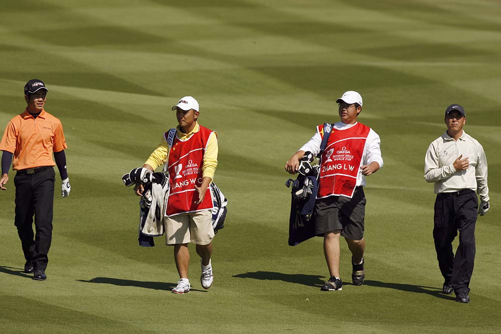 The International Golf Association took a massive leap of faith by bringing the World Cup of Golf to China. The picture shows Liang Wen Chong, (L) and Zhang Lian Wei (R) of China playing at 2008 Omega Mission Hills World Cup Golf in Shenzhen 