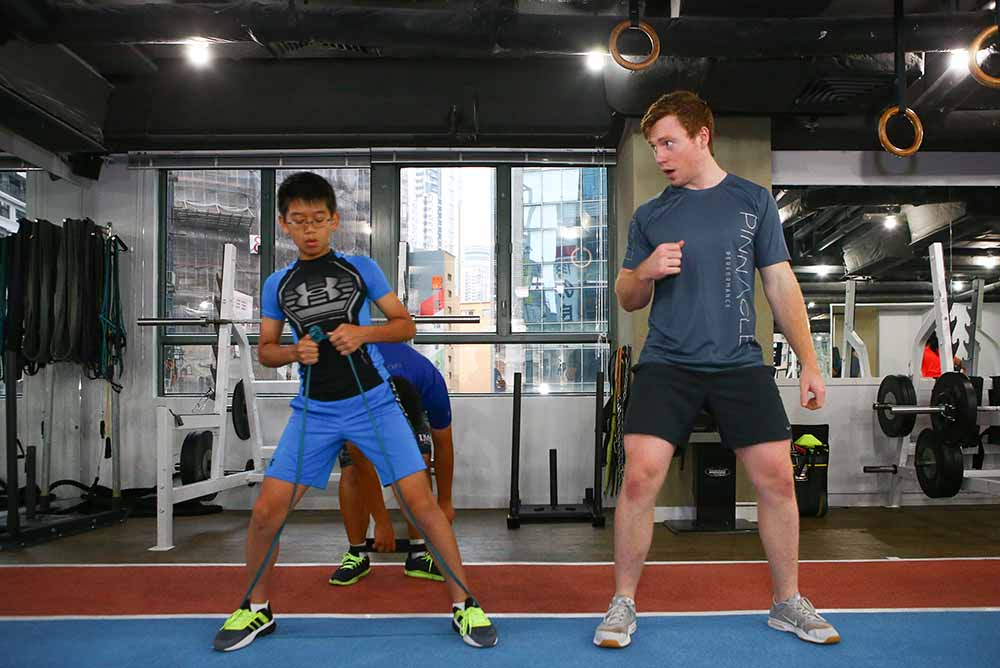 HKGA Junior team golfer Julius Yang training for hip strength