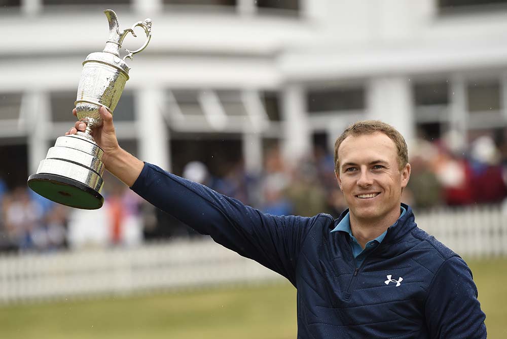 Jordan Spieth poses for pictures with the Claret Jug