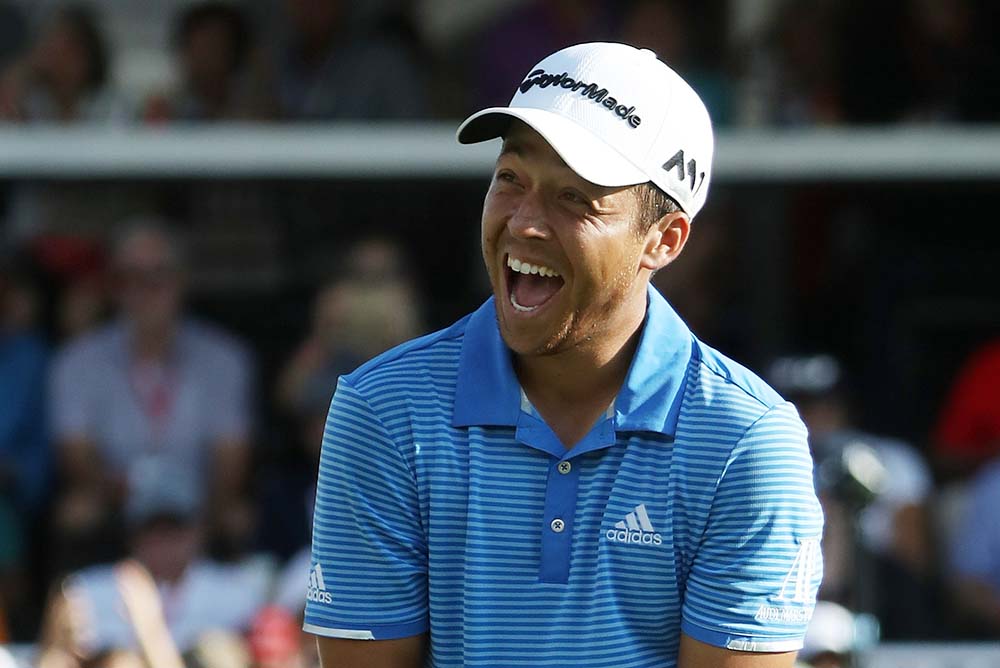 Schauffele reacts as he wins the TOUR Championship