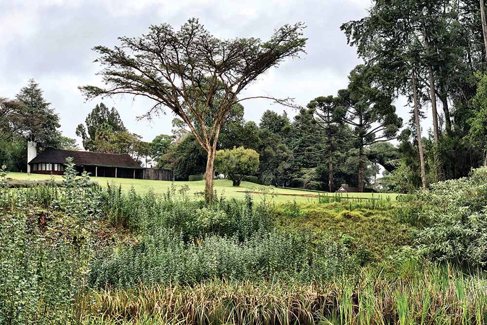 The 9th hole and clubhouse of Mount Kenya Safari Club