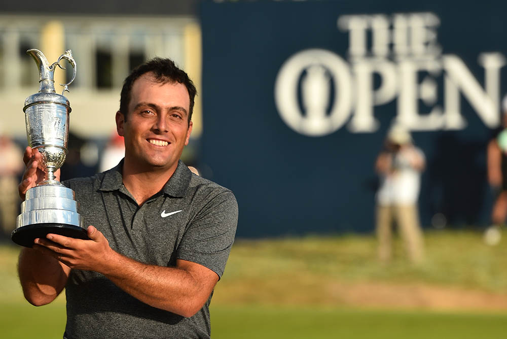Francesco Molinari poses for pictures with the Claret Jug