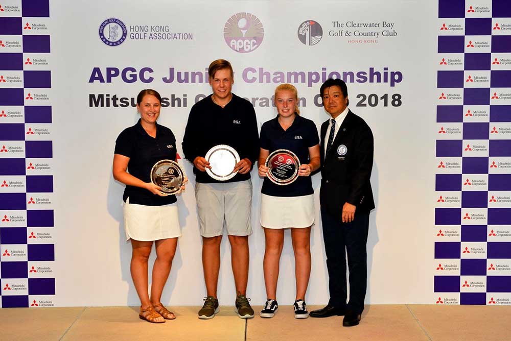 Yoshihiro Nishi, President of HKGA, presents trophies to the winners of the APGC Junior Championship and the Mitsubishi Corporation Cup
