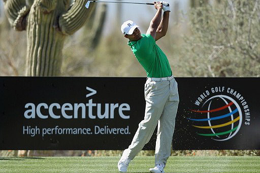 Tiger Woods won his first round match at the Accenture Match Play Championship 2012