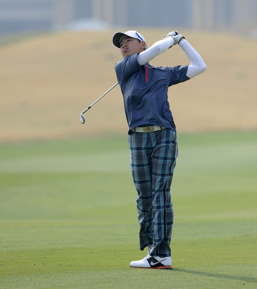 Guan Tianlang practices at Volvo China Open