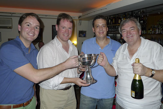 Jim Wardell (r) presents the trophy to Chad Parker, Stephen Gore and Justin Davies