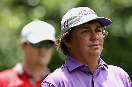 Jason Dufner (right) is one stroke ahead of Zach Johnson (left)