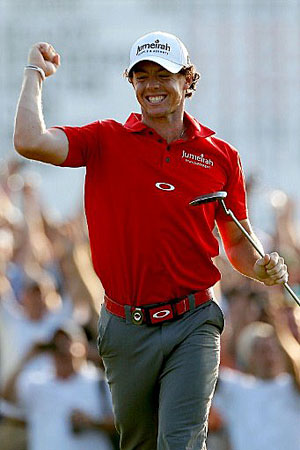 McIlroy celebrates his birdie putt on the last hole