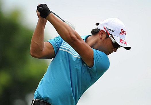 Michael Tran hits a four-under-par 68