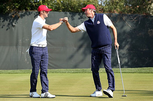 Dustin Johnson and Matt Kuchar celebrate 