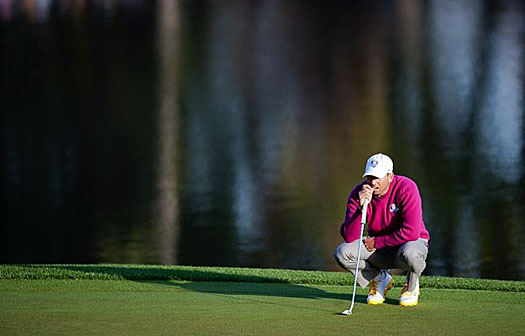 Sergio Garcia lines up his putt on the 2nd green