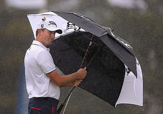 Webb Simpson had reached three-under par after seven holes before play was halted