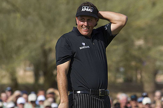 Phil Mickelson reacts after his near-miss