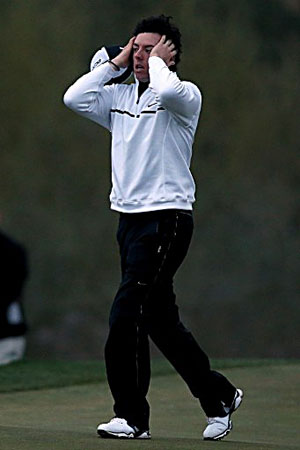 McIlroy reacts after losing to Shane Lowry