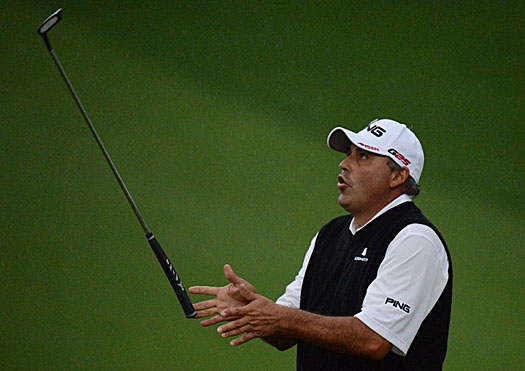 Cabrera reacts as his birdie putt comes up short on the lip of the 10th hole