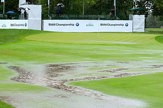 Play was delayed twice before officials halted the round until Monday morning