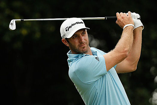 Dustin Johnson will have to hold off a chasing pack on Sunday