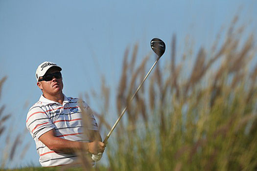 George Coetzee takes a one-shot lead with an eight-under 64