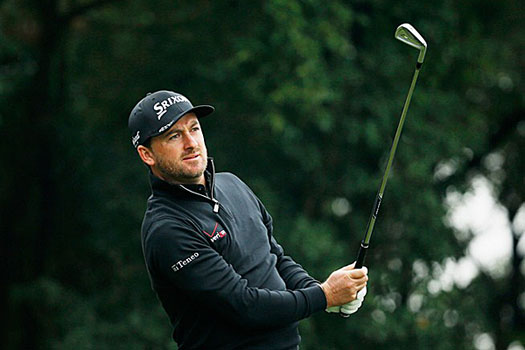 Graeme McDowell will take a one-shot lead into the final round 