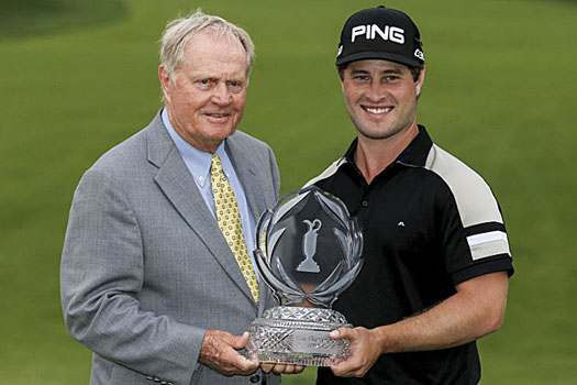 David Lingmerth of Sweden holds the tournament trophy with Jack Nicklaus