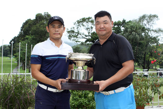 Wilson Choy and James Wong Woon-man pose with the Hong Kong Open trophy