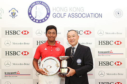 Leon D’Souza receives the Hong Kong Open Amateur Championship trophy from HKGA President Mark Chan