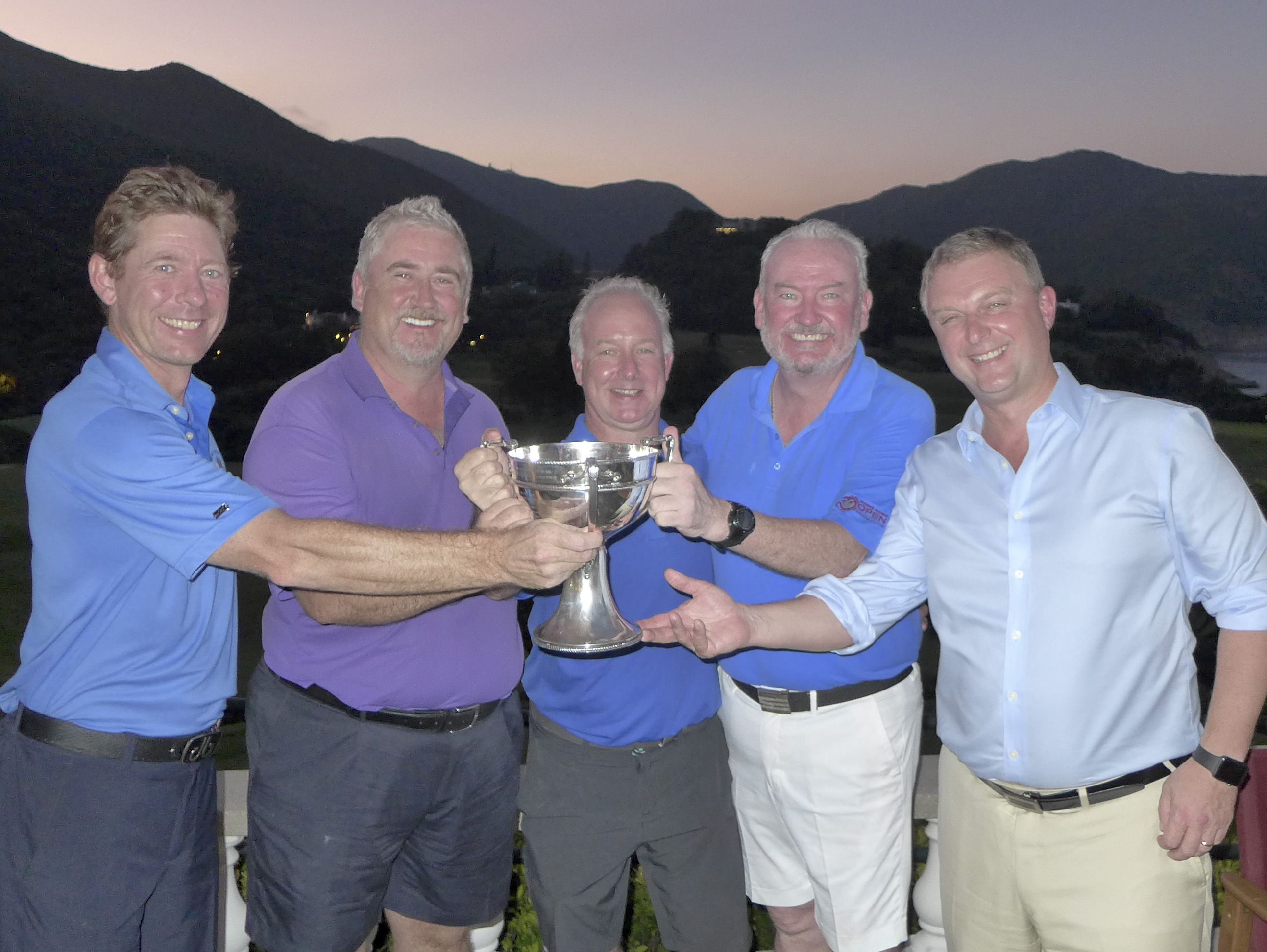 The victorious Scotland team (L to R) Derek Crampton, Paul Curran, Alan McTaggart and Charles McLaughlin being presented with the Shanghai Cup by Mark Bromhead