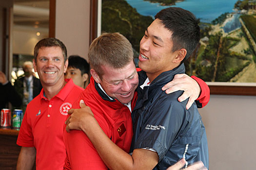 The moment of triumph - Jin Cheng and coach Michael Dickie