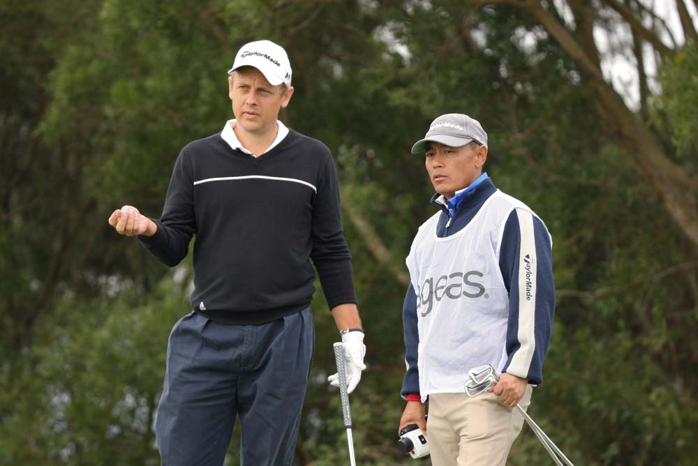 James Stewart is studying the par-3 14th at Clearwater Bay