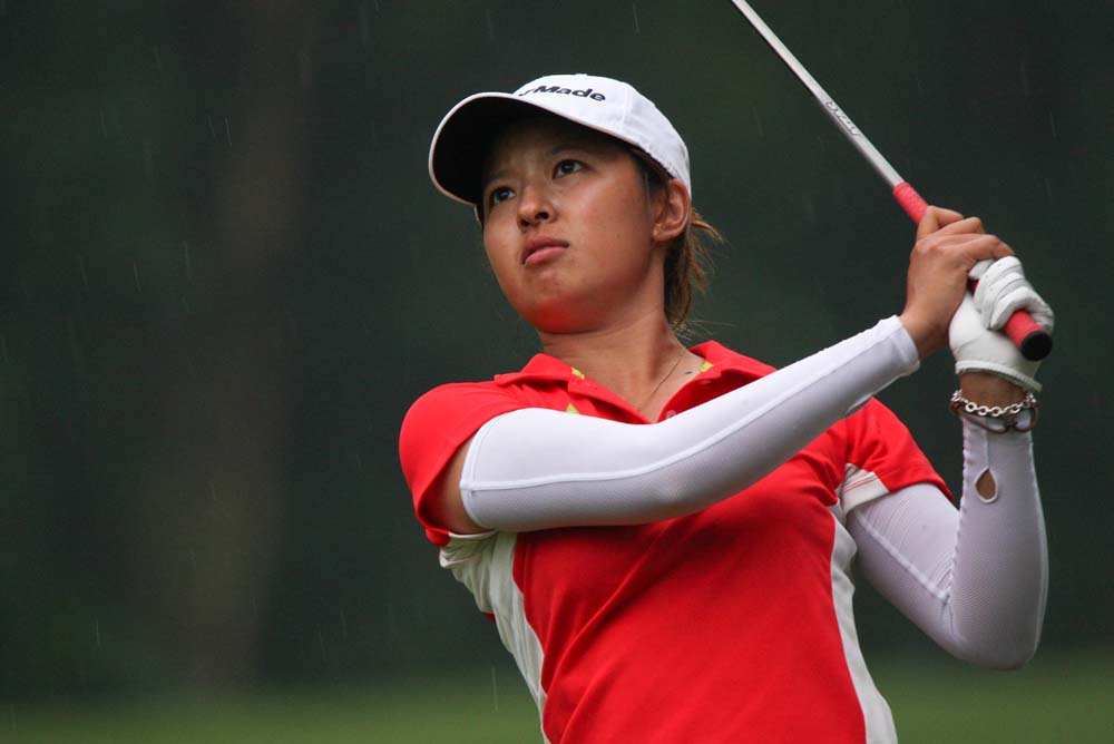 She fires her approach shot during the playoff